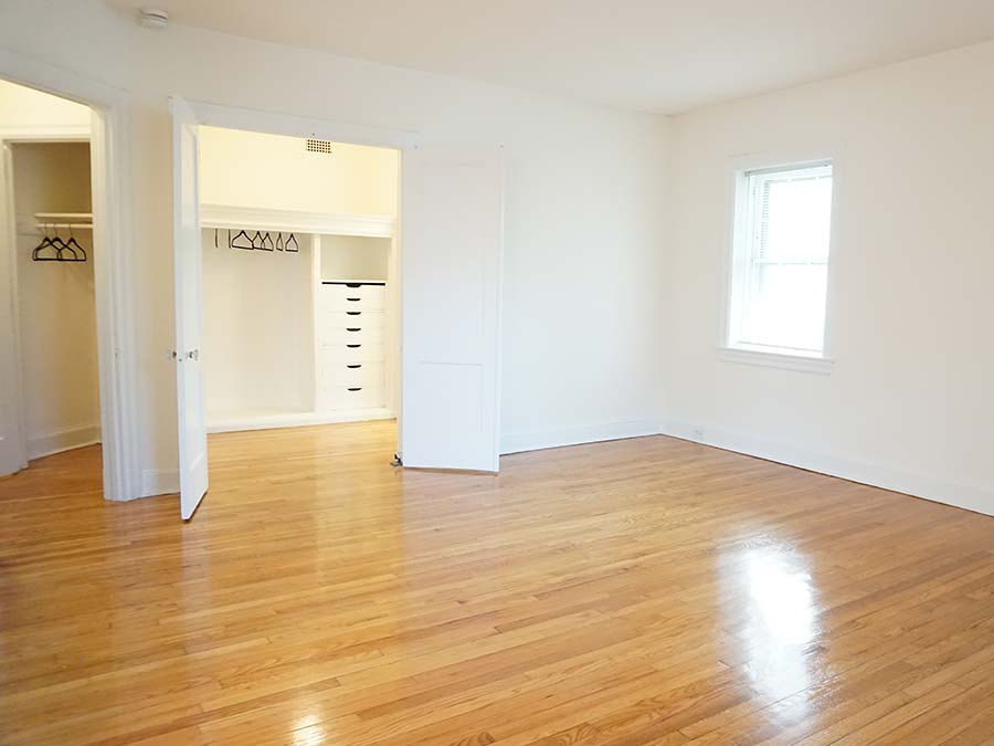 Unfurnished bedroom with a walk-in closet in an apartment at Edgehill Court in Bala Cynwyd, PA.