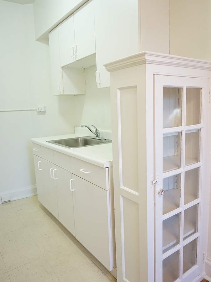 Sink and white shelves in an apartment at Edgehill Court in Bala Cynwyd, PA.