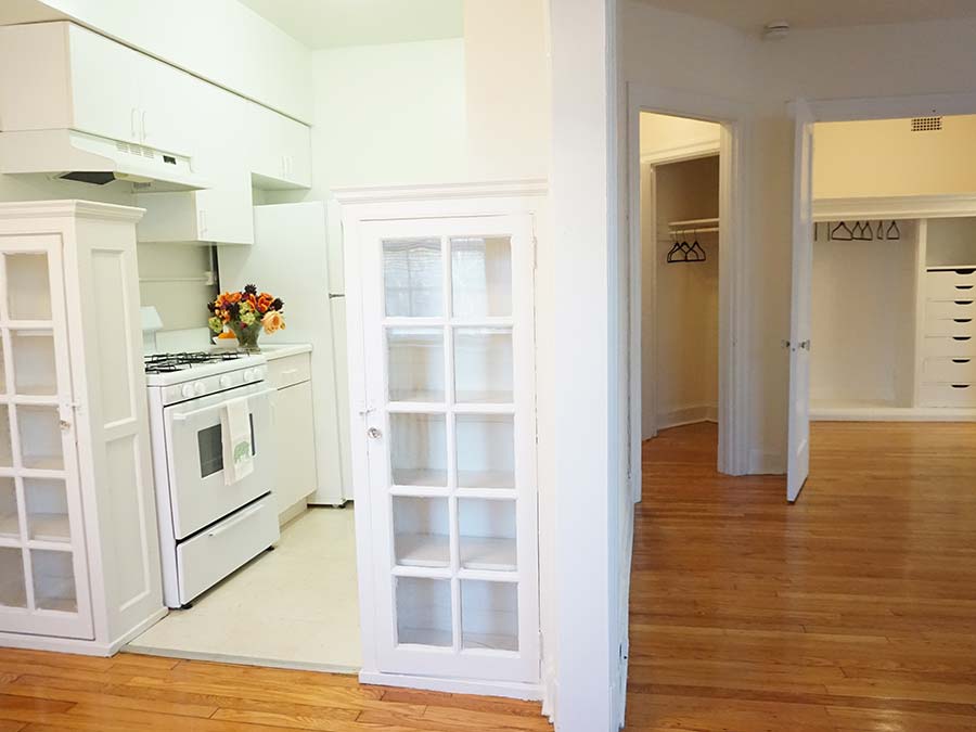 Kitchen and living room space with spacious closet at Edgehill Court apartments in Bala Cynwyd, PA.