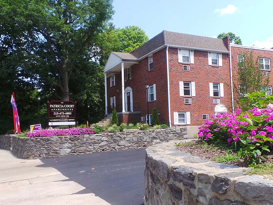 Entrance with sign to Patricia Court apartments in Lansdowne, PA