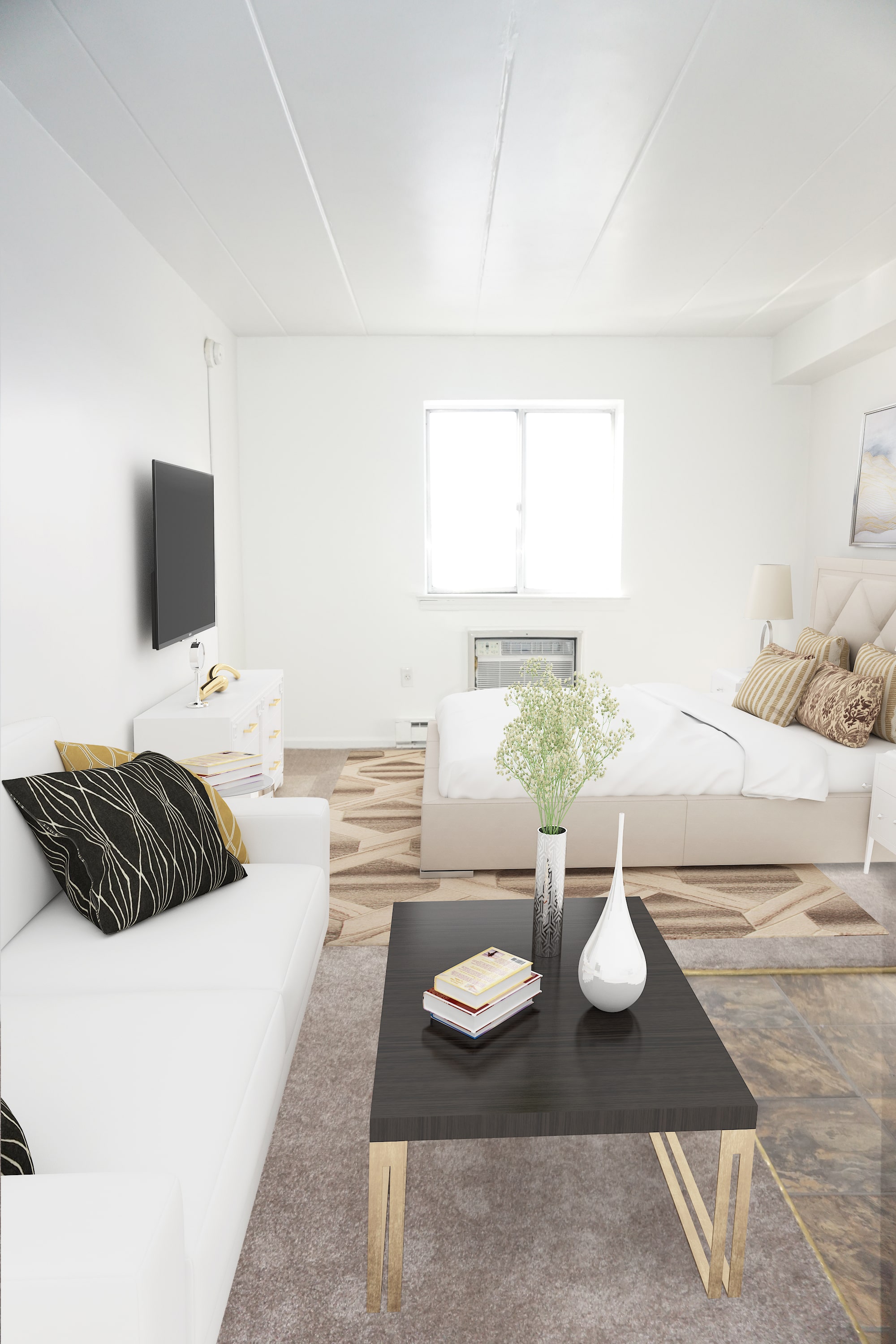 furnished studio apartment with air conditioner at Bridgeport Suites in Bridgeport, PA