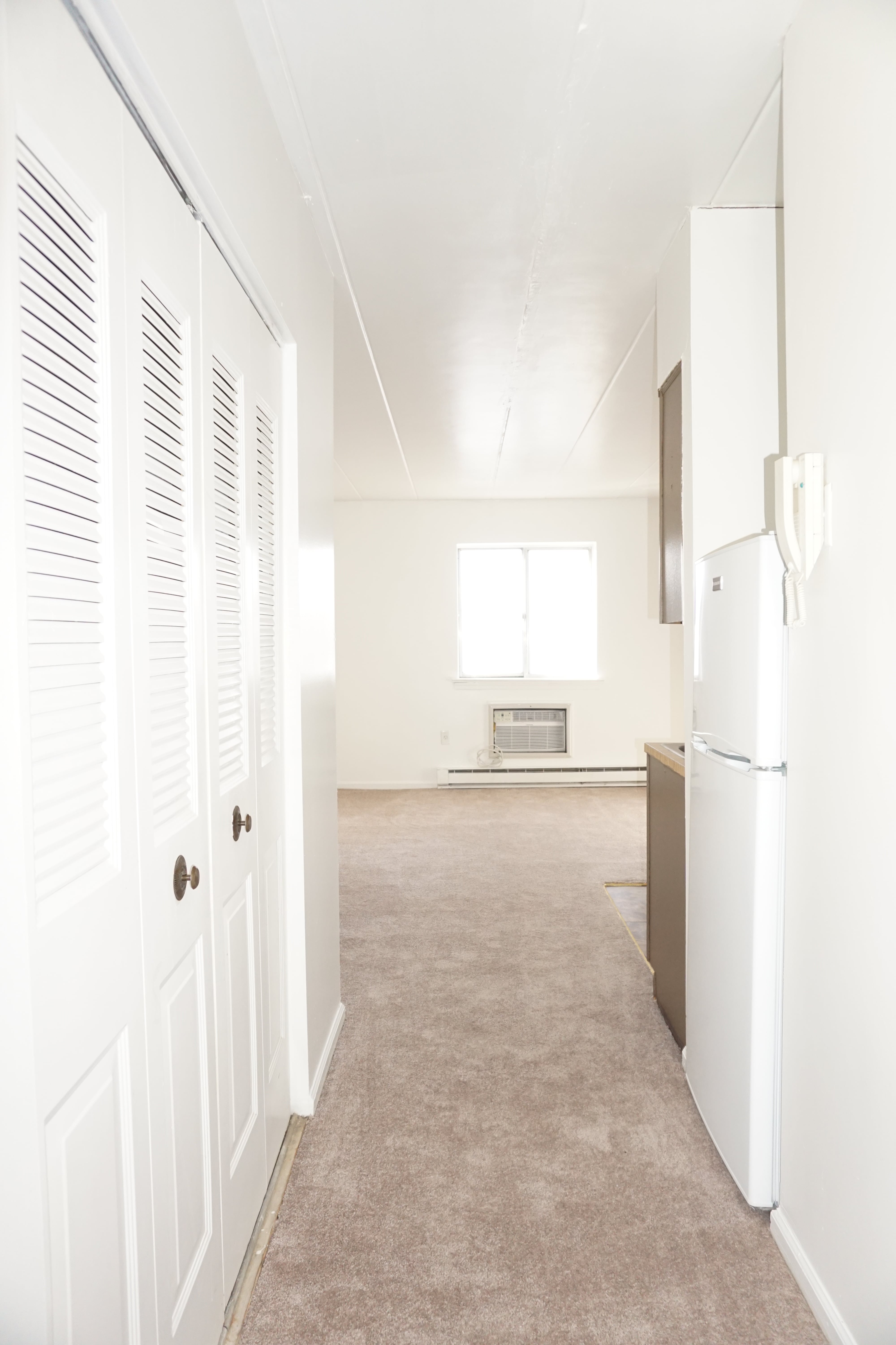 entry and hall closet to a studio apartment at Bridgeport Suites in Bridgeport, PA